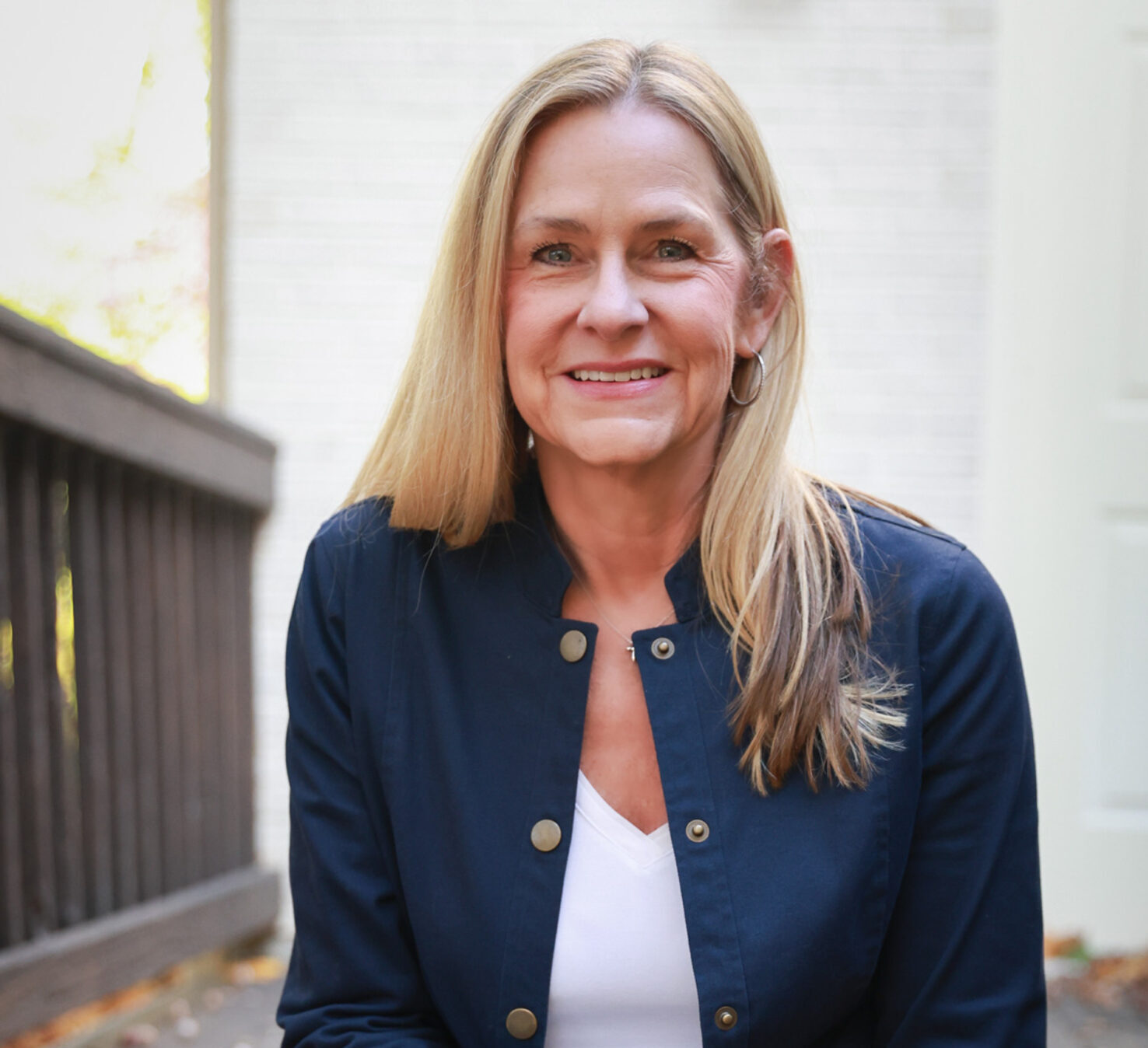Tammy sitting on stairs